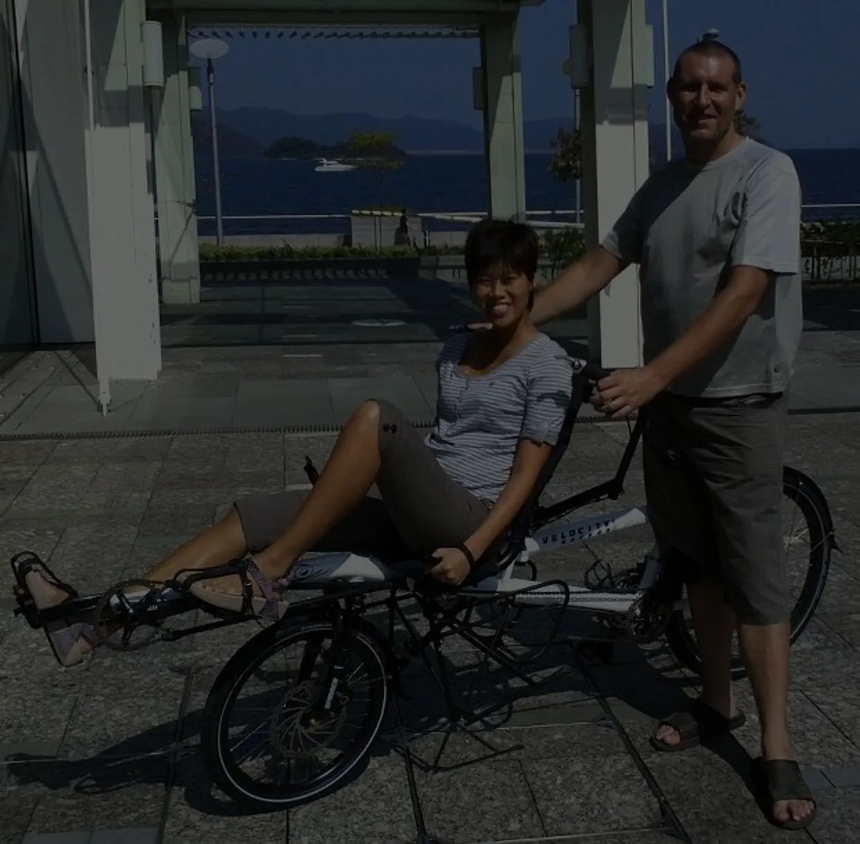 Natt and Paul on 'white giraffe' tandem bicycle