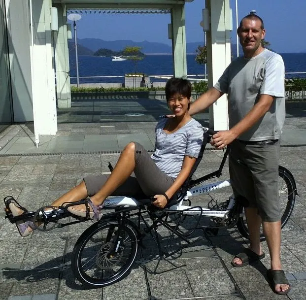 Natt and Paul on 'white giraffe' tandem bicycle